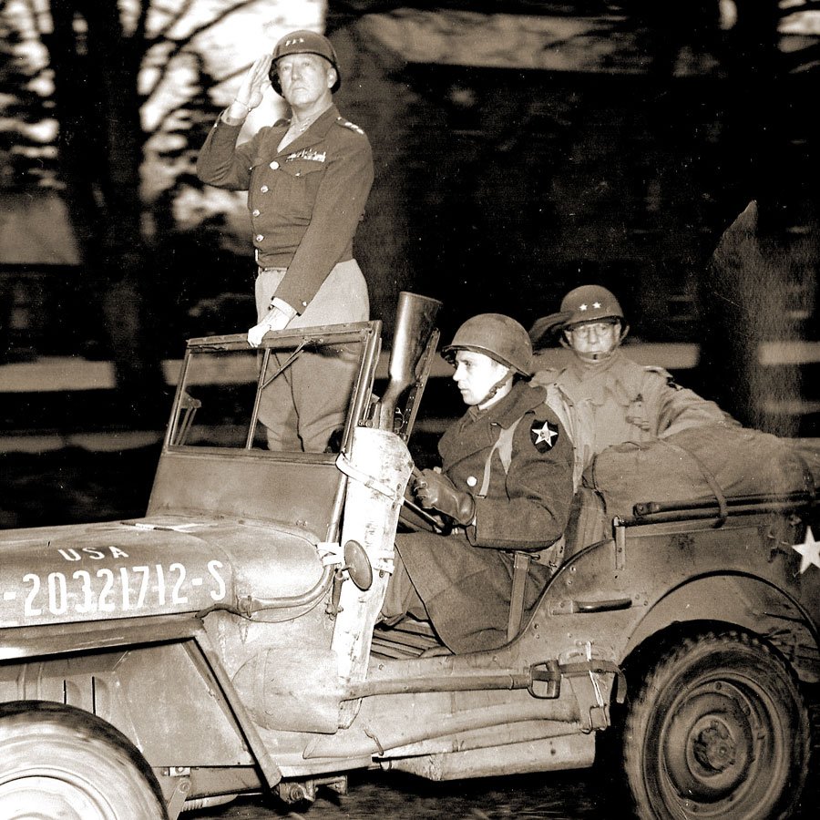 Wartime photo of Patton in a jeep