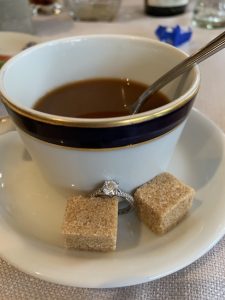 engagement ring with coffee