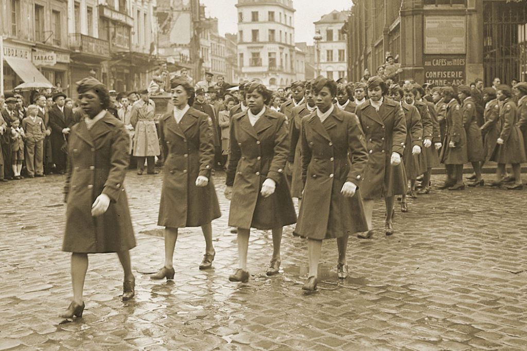 6888th marching in a parade in France