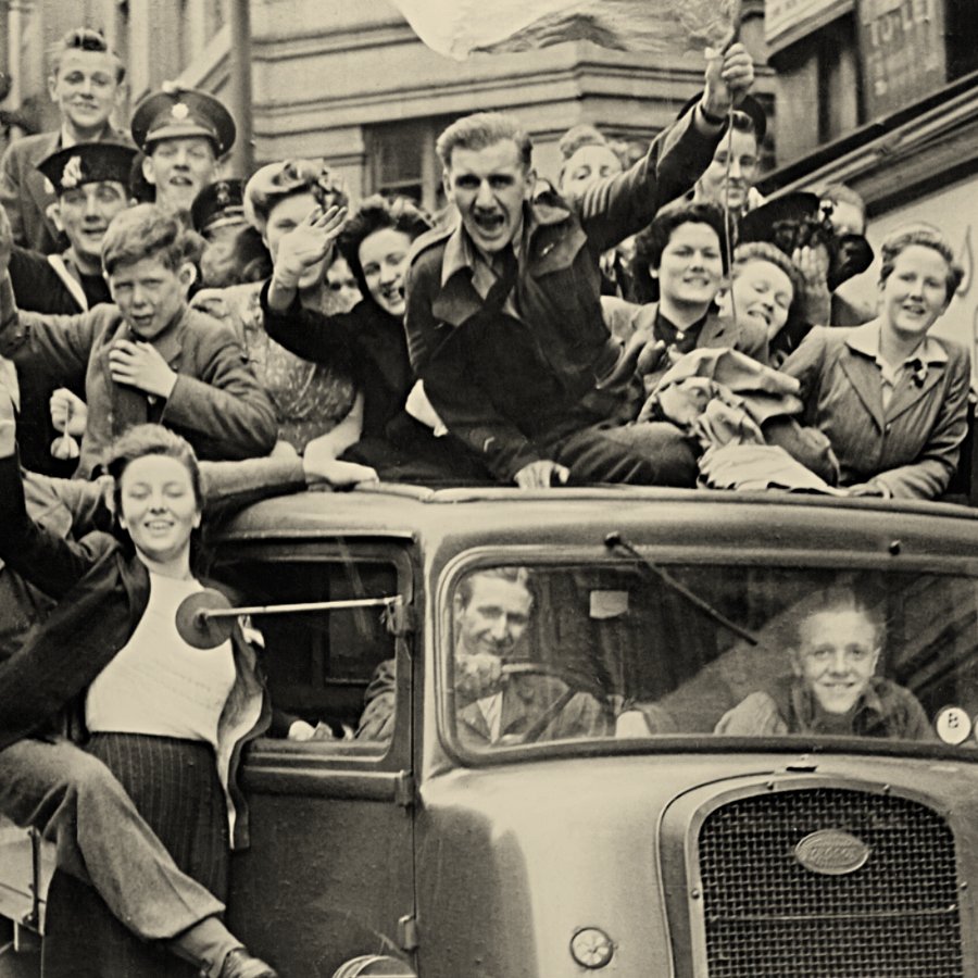 People celebrating after WWII ends in Europe
